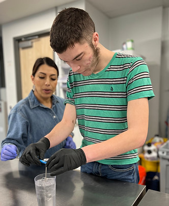 Nicholas calibrating a thermometer.jpeg